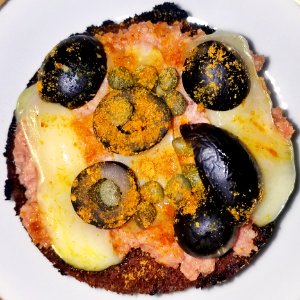 Deviled ham with cheddar, black olives, capers, mustard, and chili powder on toasted Boston brown bread - Massachusetts