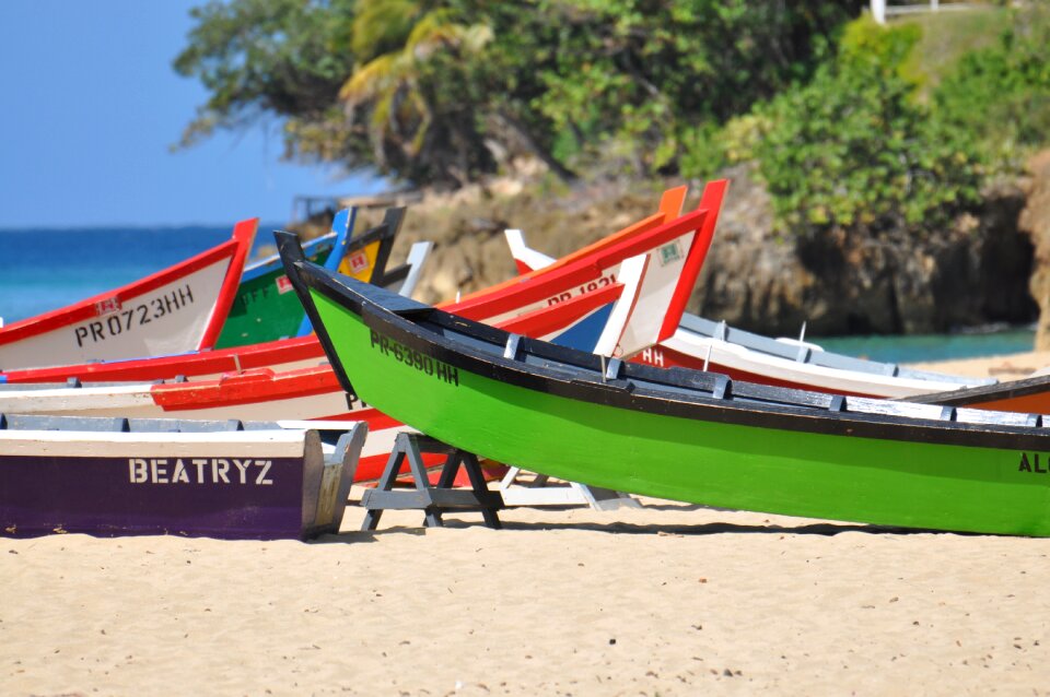 Wooden boats sand beach