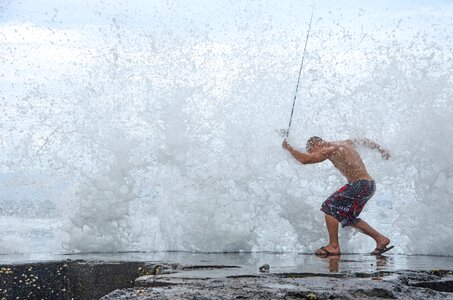 Man swimming trunks fish