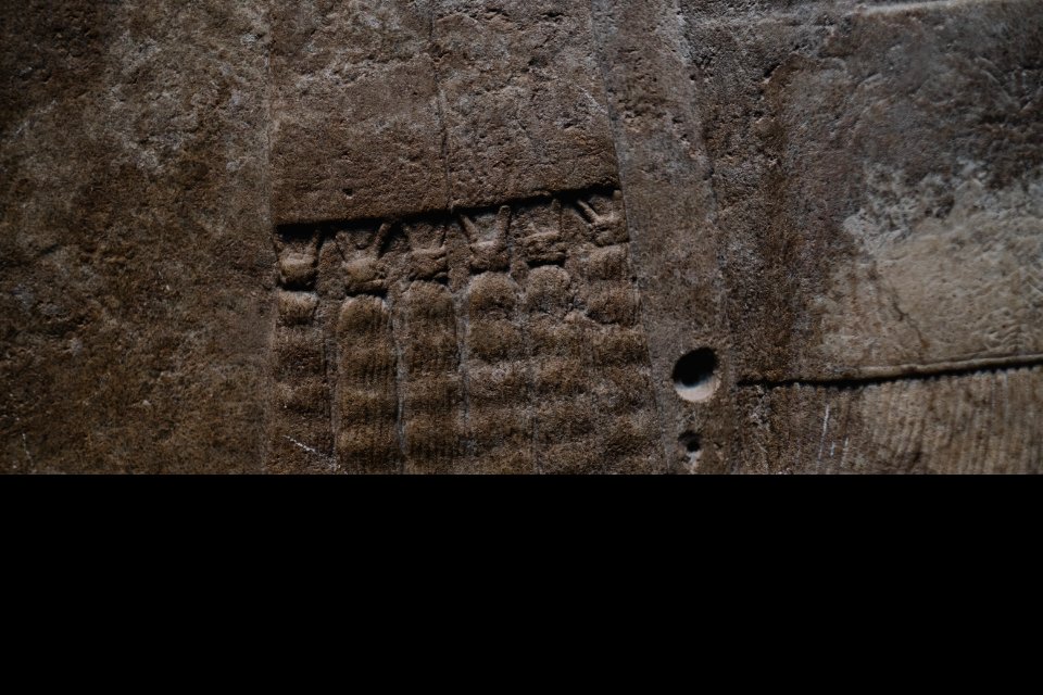 Details of the lamassu and palace reliefs of Neo-Assyrian king Ashurnasirpal (883-881 BC) at the Metropolitan Museum of Art