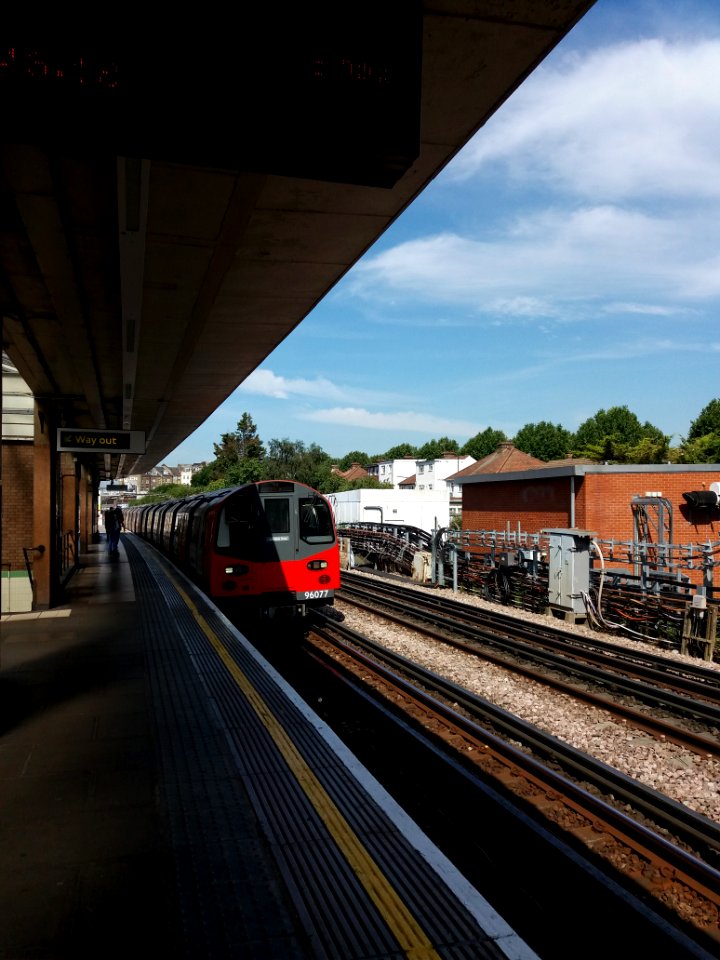 Dollis Hill tube station, platform with train