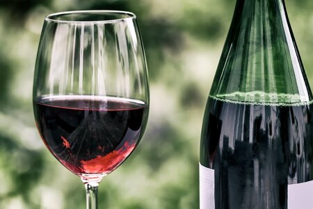 Wine bottle red wine glass