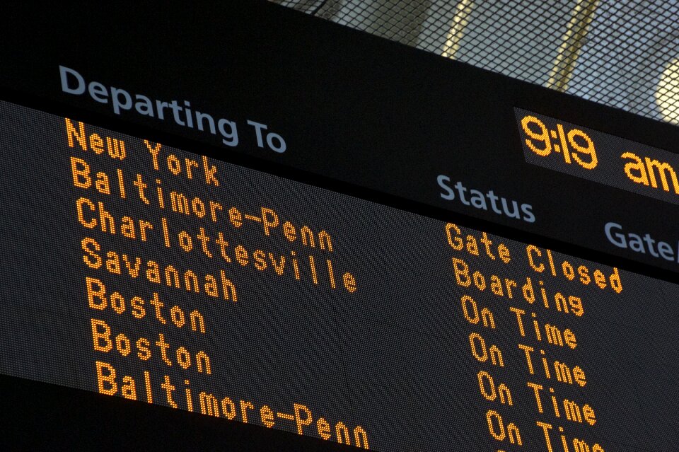 Sign train station departing to