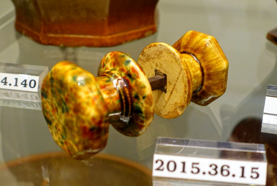 Doorknobs, Lyman, Fenton, & Co., Bennington VT, c. 1852, lead-glazed yellow earthenware, Rockingham glaze, item HD 2015.36.15 - Flynt Center of Early New England Life - Deerfield, Massachusetts - DSC04184