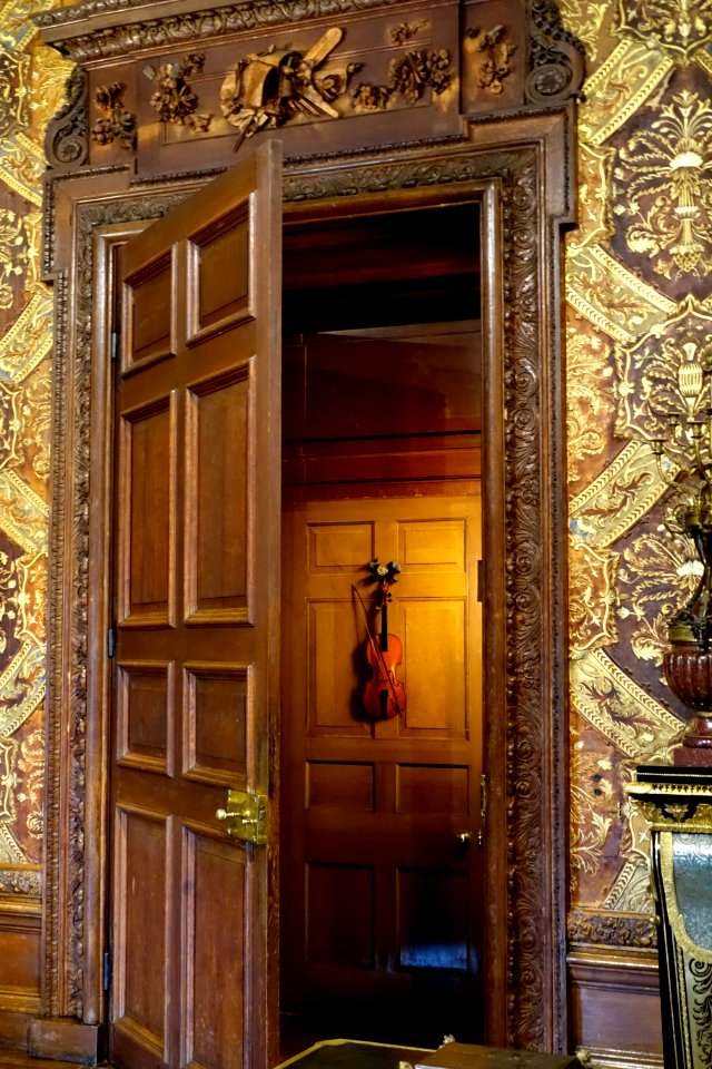 Doorway with tromope l'oeil violin by Jan van der Vaart, 1700s - State Music Room, Chatsworth House - Derbyshire, England - DSC03207