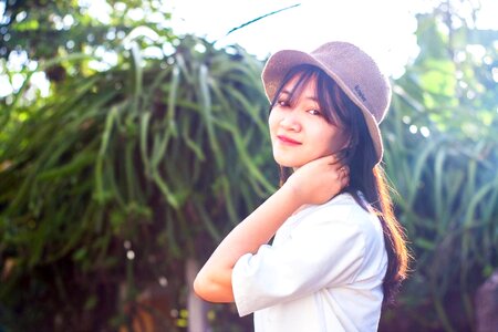 Young asia the hat
