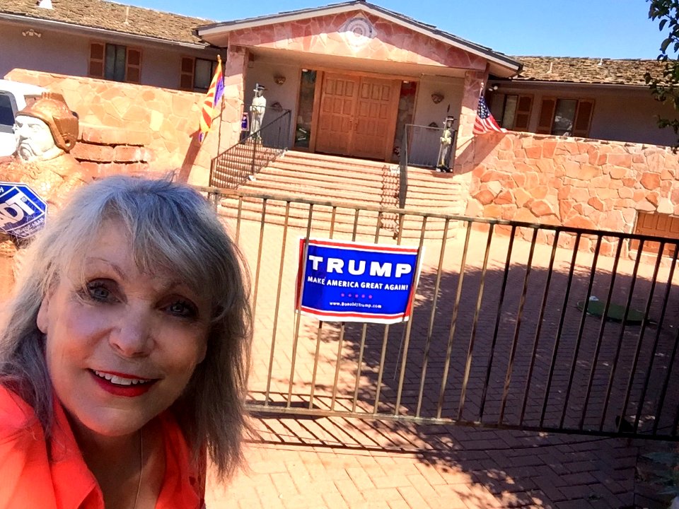 Donald Trump - Terrie with Trump sign in front of House