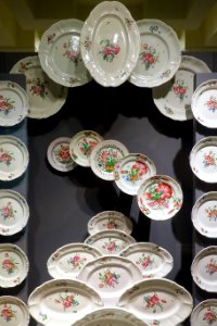 Dinner service, France, Niderviller, 1770-1789, with plates in center, France, Saint Clement, early 1800s, faience - Museum of Anthropology, University of British Columbia - DSC09129