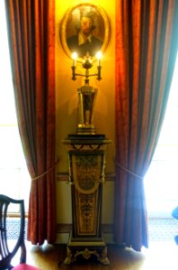 Egyptian-revival lamp, c. 1805, porcelain, on pedestal after André-Charles Boulle, 1 of 2, 1800-1900, metal, pewter, wood - Saloon - Kingston Lacy - Dorset, England - DSC03500