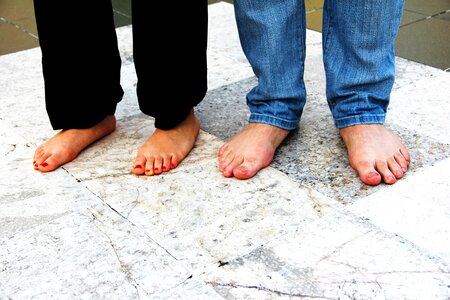 Two pair lacquered toe nails