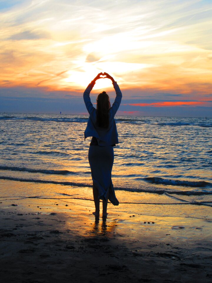Colorful sunset girl gesture