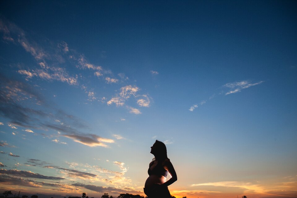Happy against light sky