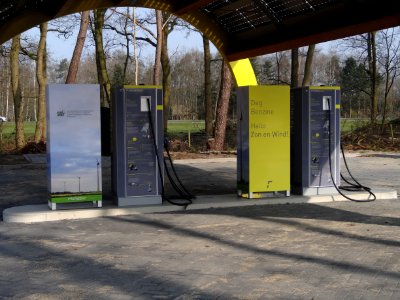 Electric vehicle charging stations at motorway station on highway in the Netherlands 2