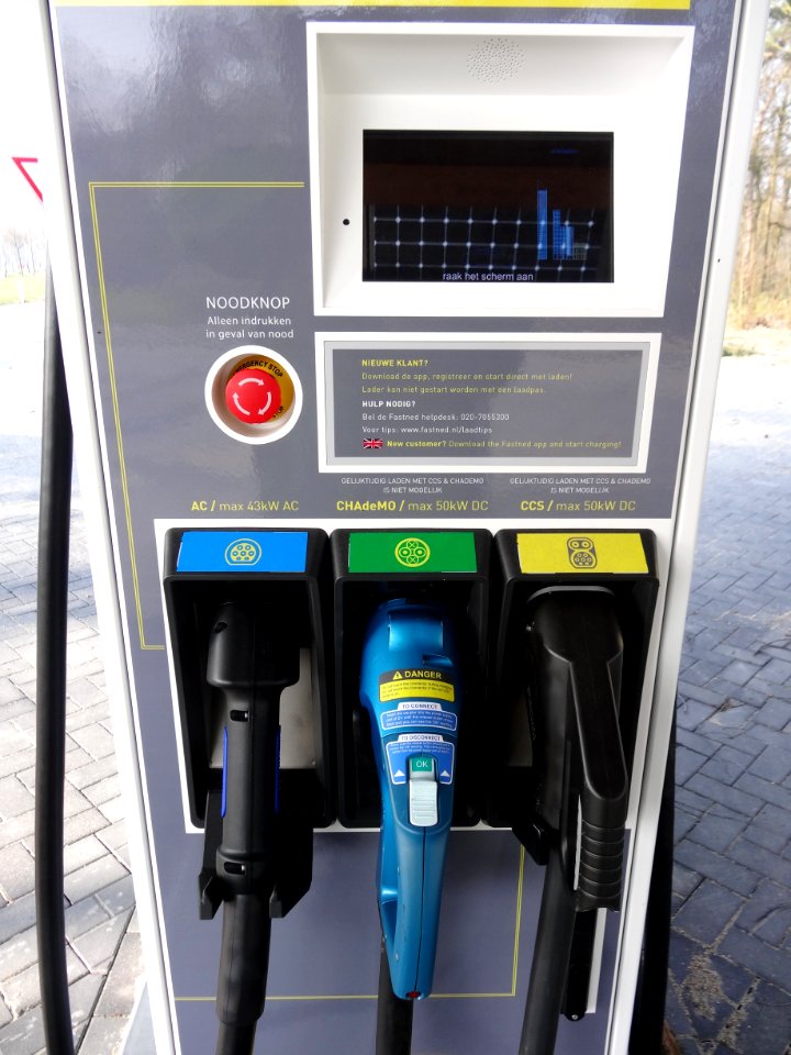 Electric vehicle charging stations at motorway station on highway in the Netherlands 3