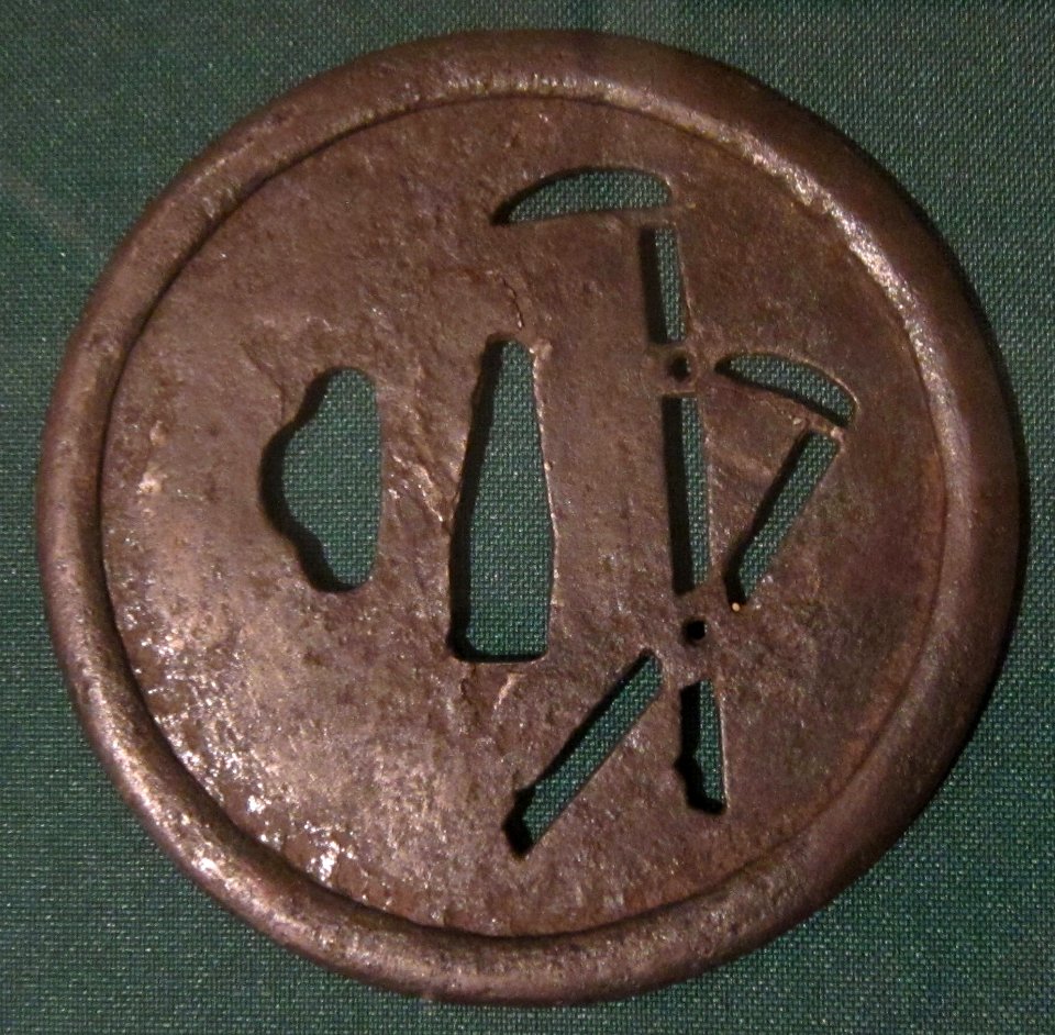 Early armorer's sword guard (ko-katchushi), Muromachi period, mid-15th century, iron