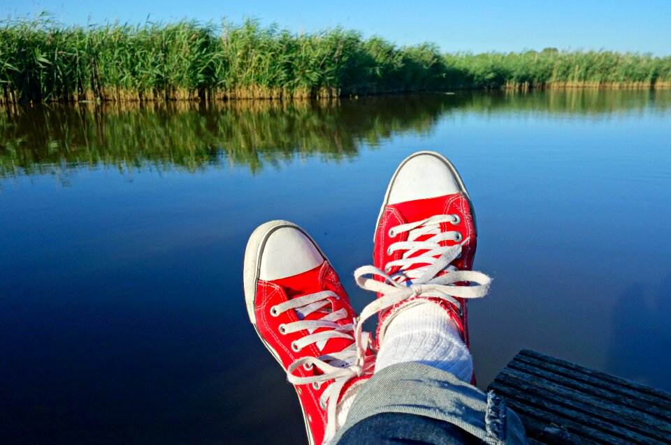 Crossed feet legs female photo