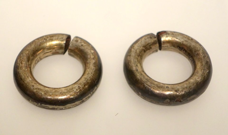 Earrings given to Ke Ve by her parents-in-law, Ta Oi, A Luoi, Thua Thien Hue, 1956, silver - Vietnamese Women's Museum - Hanoi, Vietnam - DSC04393