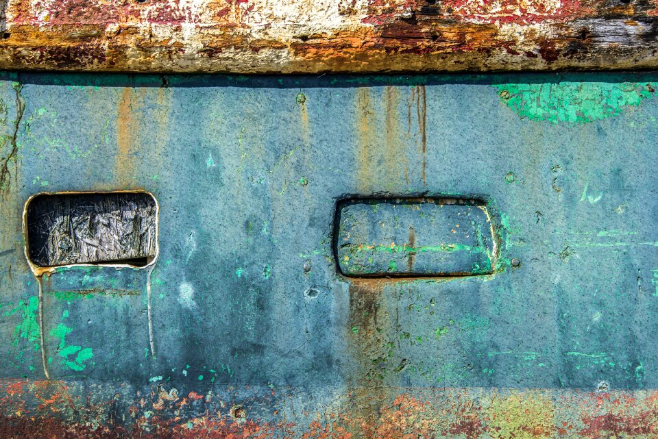 Boat hull peeling paint old boat