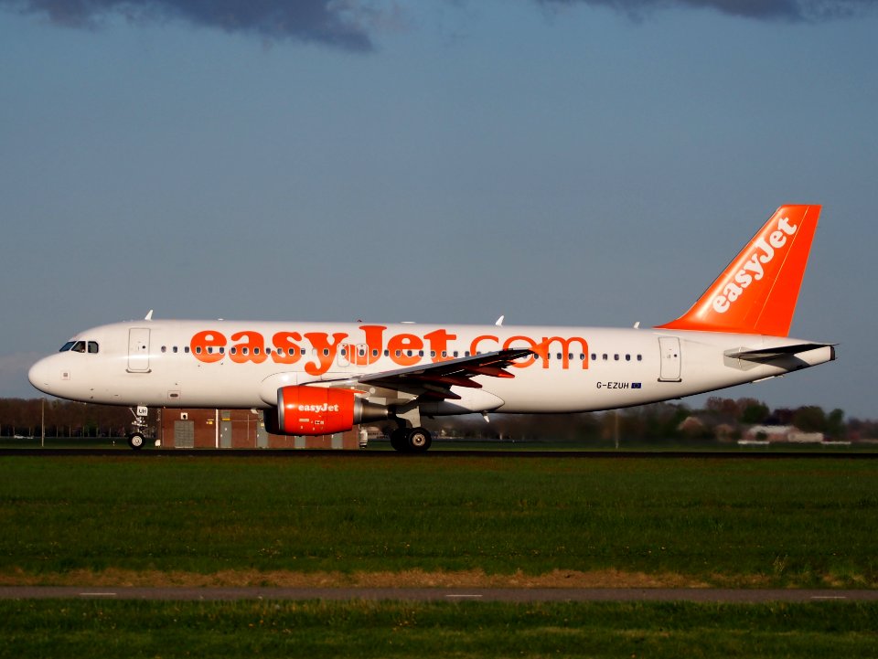 Easyjet Airbus 320 G-EZUH takeoff from Polderbaan, Schiphol (AMS - EHAM) at sunset, pic2
