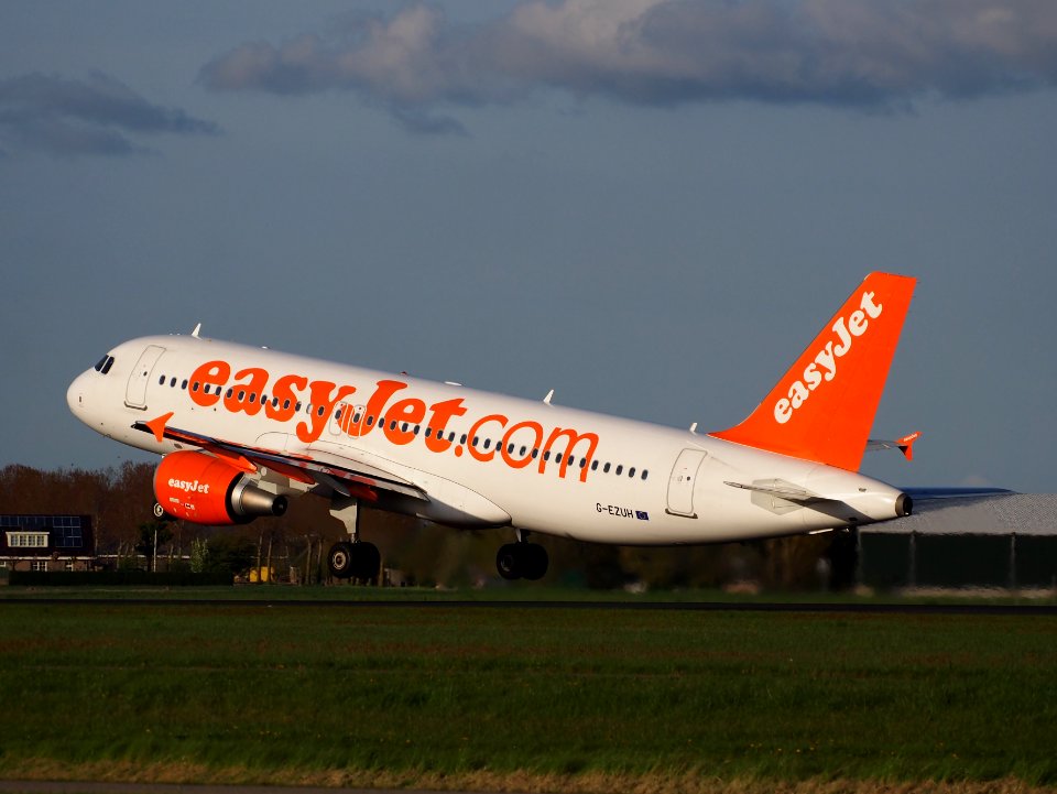 Easyjet Airbus 320 G-EZUH takeoff from Polderbaan, Schiphol (AMS - EHAM) at sunset, pic3 photo