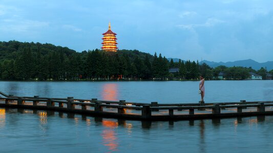 Hangzhou west lake night leifeng pagoda lights west lake bridge park photo