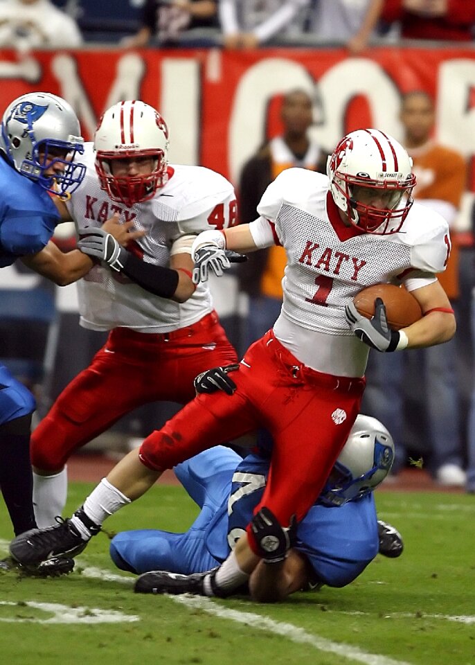 American football player helmet player