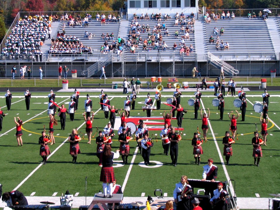 Edinboro Pipers with Marching band at Football homecoming