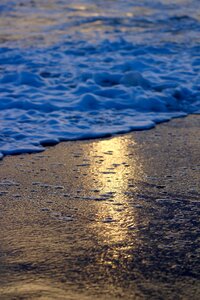 Sea sand sunset photo