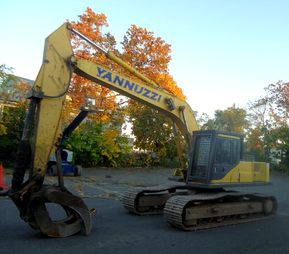 Excavating equipment in a parking lot