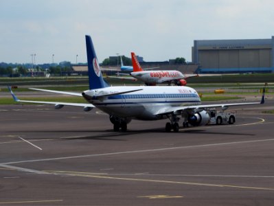 EW-400PO Belavia Embraer 195 push back at Schiphol (AMS - EHAM), The Netherlands, 24may2014, pic-2