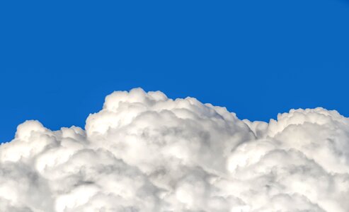 Puffy cotton blue sky photo