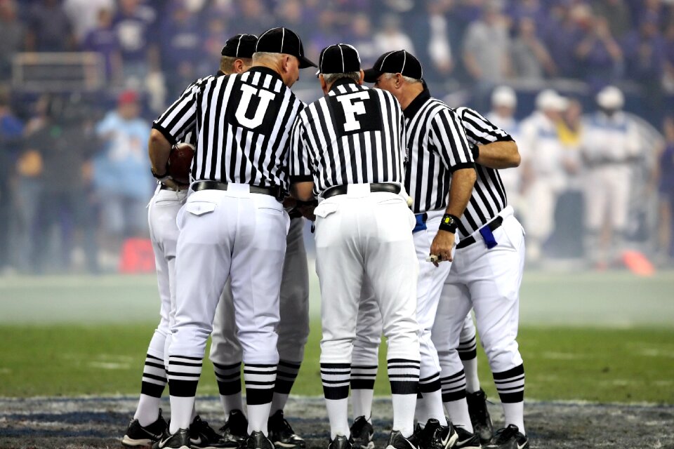 Referee football game officiating crew