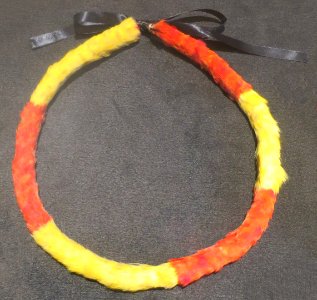 Feathered garland (lei hulu), kamoe style, property of Charles Reed Bishop