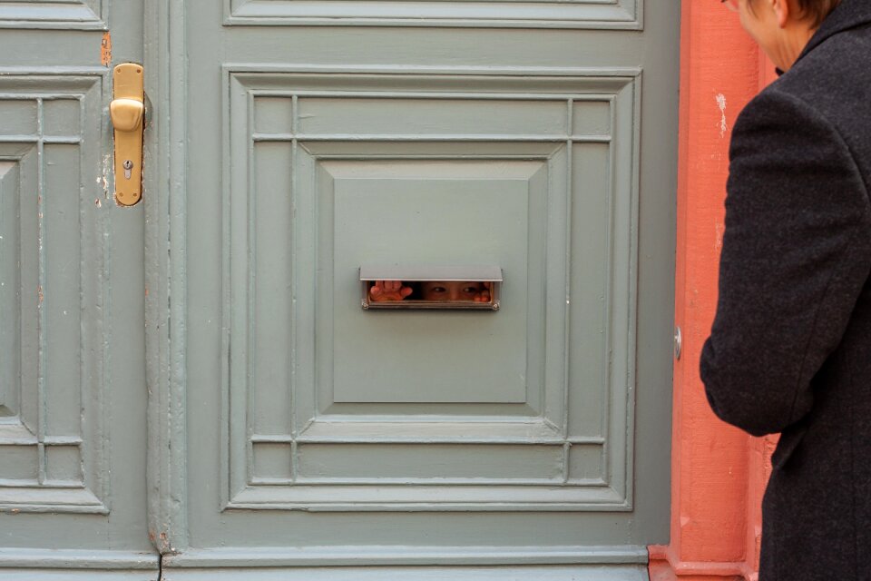 Front door letter-box slot child