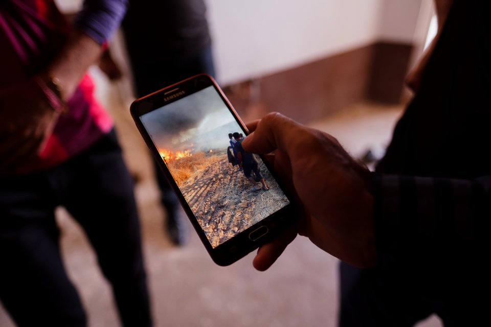 Ezidis showing the fires that ravaged Sinjar region in 2019 in summer 30