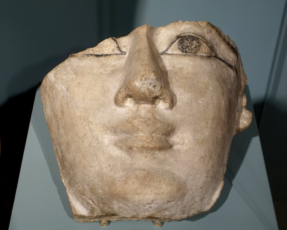 Face from a monolithic sarcophagus lid, Egyptian, Ptolemaic period, 323-330 BC, limestone with black paint - Middlebury College Museum of Art - Middlebury, VT - DSC08047