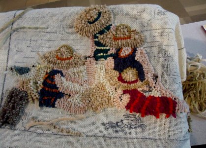 Fabric created by rug hooking method photo