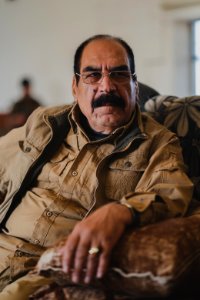 Ezidi Peshmerga commander Qasim Shesho giving an interview at his base in the Sinjar Mountains 19