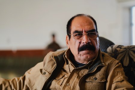 Ezidi Peshmerga commander Qasim Shesho giving an interview at his base in the Sinjar Mountains 18