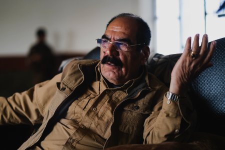Ezidi Peshmerga commander Qasim Shesho giving an interview at his base in the Sinjar Mountains 14
