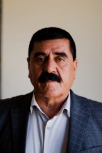 Ezidi Mayor Fahad Hamid of Shingal in summer of 2019 in his office, discussing the fires plaguing the district 06