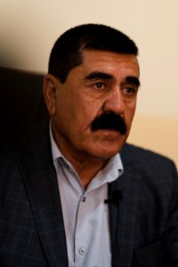 Ezidi Mayor Fahad Hamid of Shingal in summer of 2019 in his office, discussing the fires plaguing the district 02
