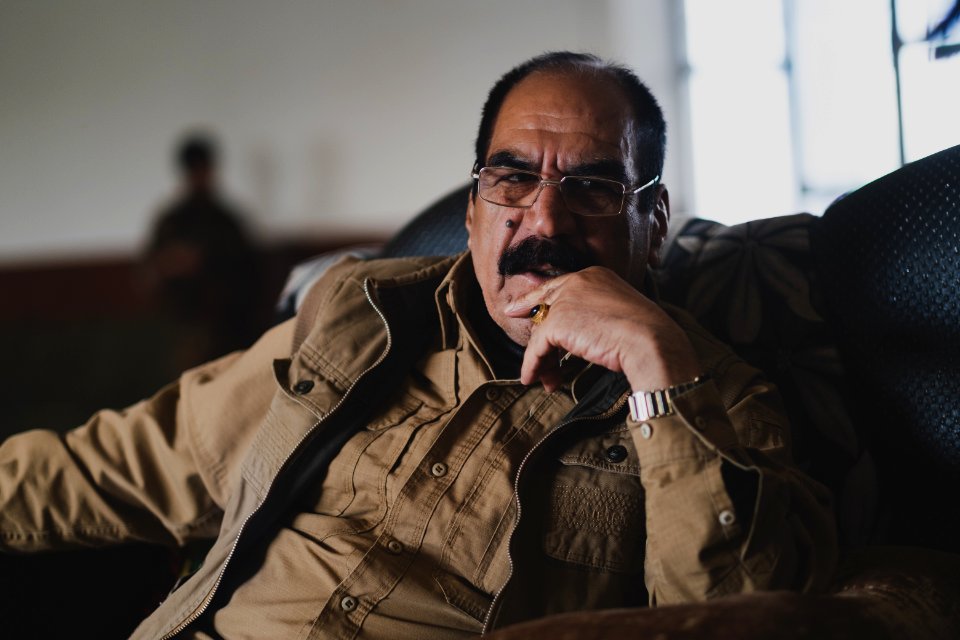 Ezidi Peshmerga commander Qasim Shesho giving an interview at his base in the Sinjar Mountains 16