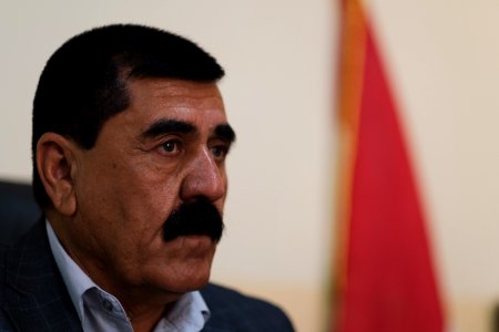 Ezidi Mayor Fahad Hamid of Shingal in summer of 2019 in his office, discussing the fires plaguing the district 04