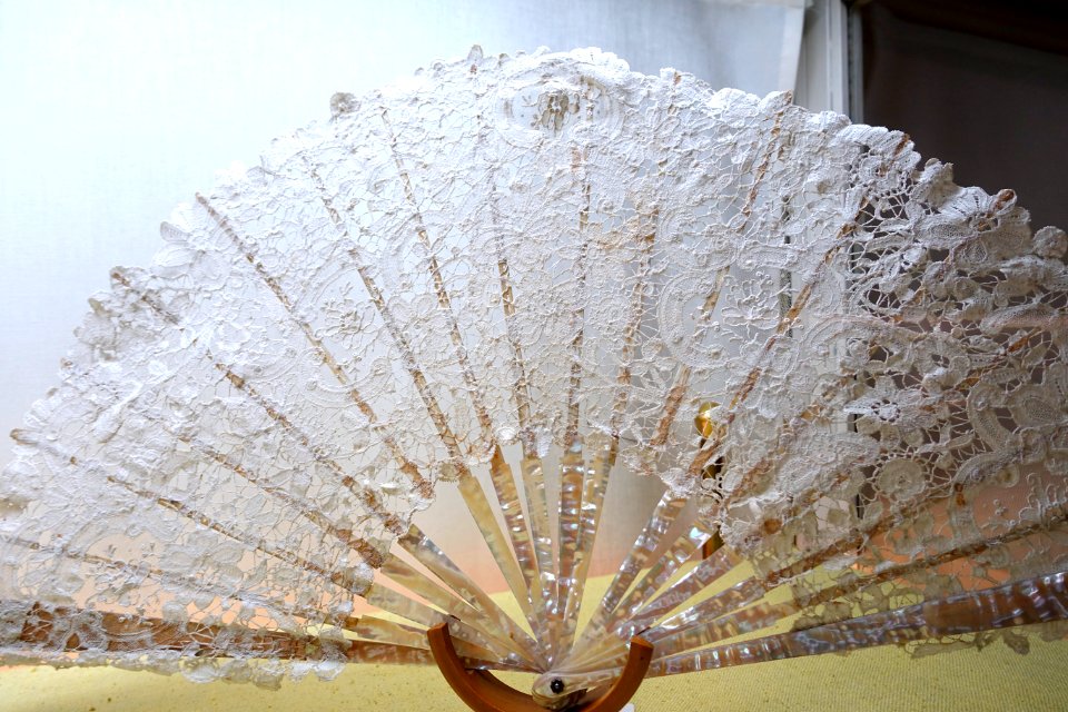 Fan, Europe, 19th century, mother of pearl ribs and Brussels lace - Fan Room, Alcázar of Seville, Spain - DSC07329