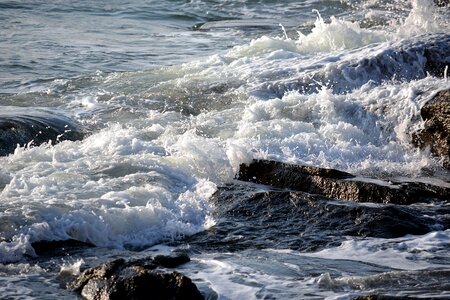 Rocks tide wind photo