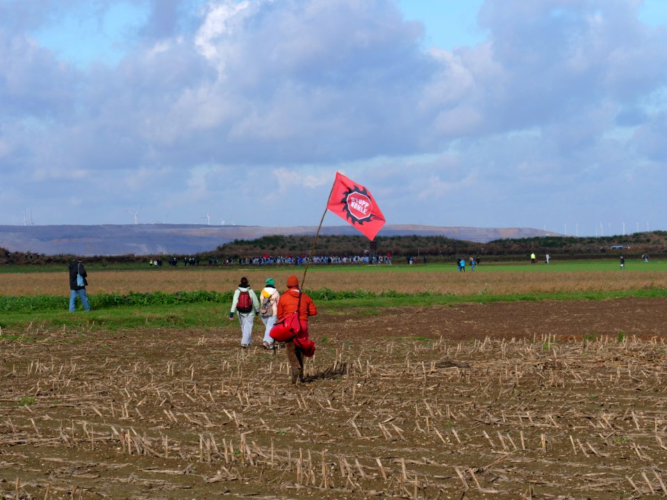 Ende Gelände November 2017 - Activist holding flag