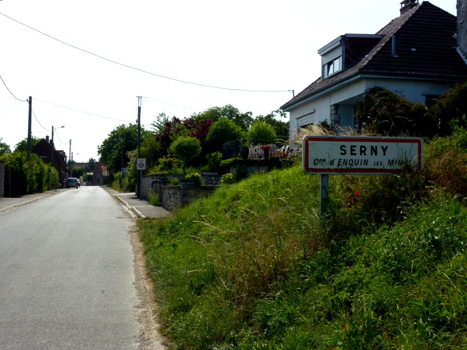 Enquin-les-Mines (Pas-de-Calais, Fr) city limit sign Serny