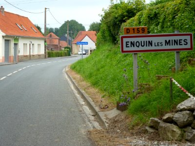 Enquin-les-Mines (Pas-de-Calais, Fr) city limit sign