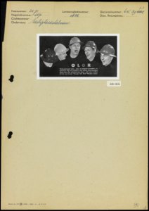 Engelstalige reclame voor veiligheidshelmen, Bestanddeelnr 256-1832